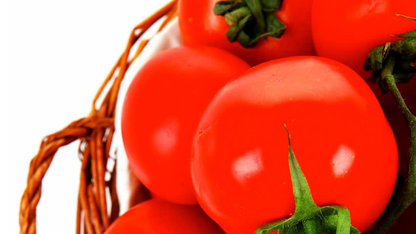 raw fresh tomatoes in wicker basket on green branch 1920x1080 intro motion slow hidef hd