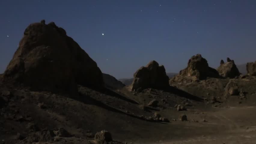 Astrophotography Time Lapse Moon Shadow Casting Across Pinnacles Pan Right