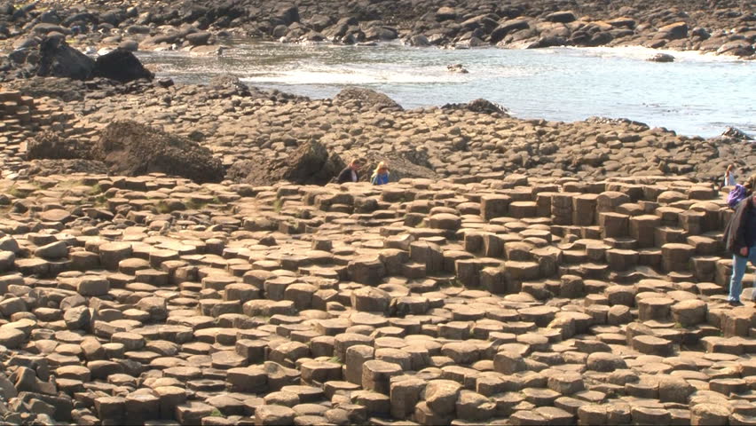 NORTHERN IRELAND - AUGUST 2012:People enjoying walking on the Giant's Causeway in Ireland.