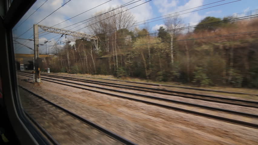 Train travel UK. Arched bridge.
Travelling by train. Going underneath an arched bridge. London, UK. 

