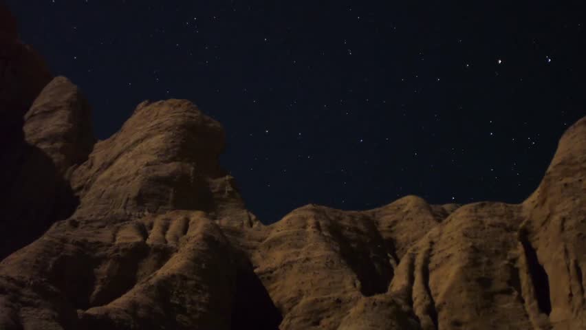 Astrophotography Time Lapse Moonshadow across Sandstone