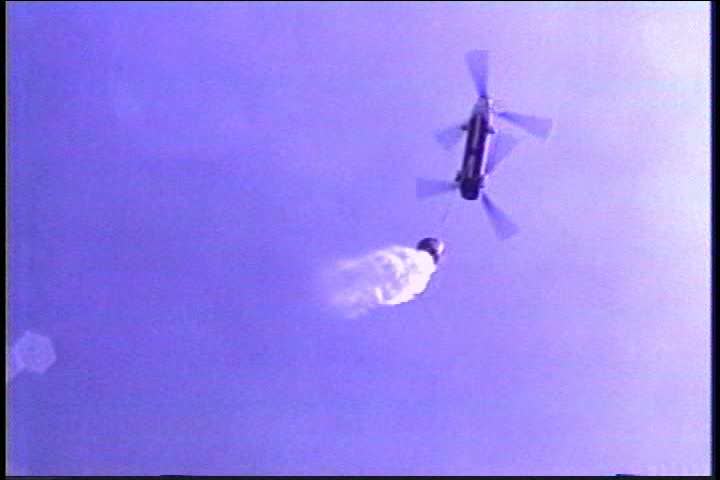 2000s - An airdrop of fire retardant material on a wildfire or forest fire from a helicopter.