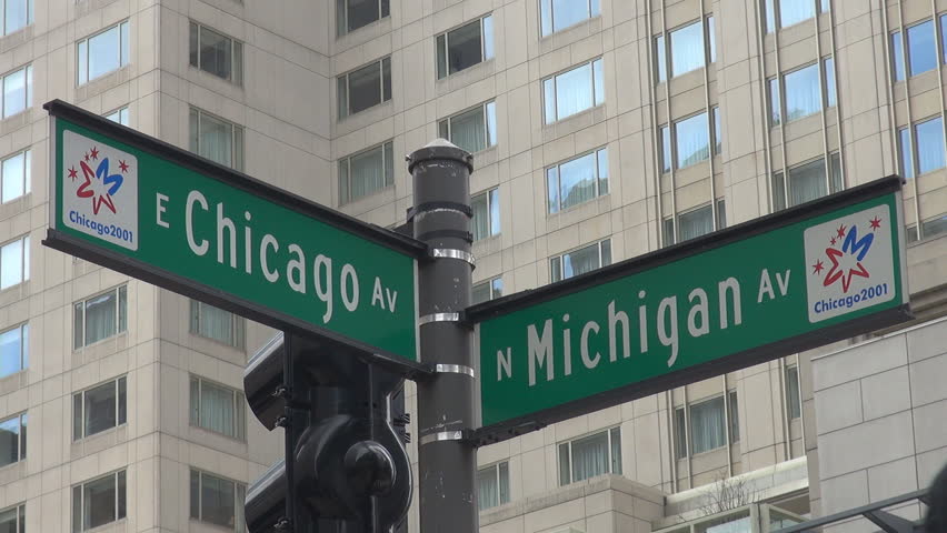 CHICAGO,USA - APRIL 17, 2013, Chicago street sign and modern building, Michigan and Chicago Avenue, Illinois, 