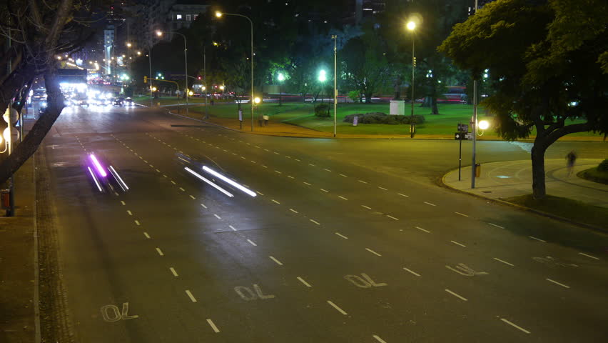Traffic in the city. Avenue Time-Lapse, Night. Heavy traffic / jam / flowing with blurred motion. Dusk.