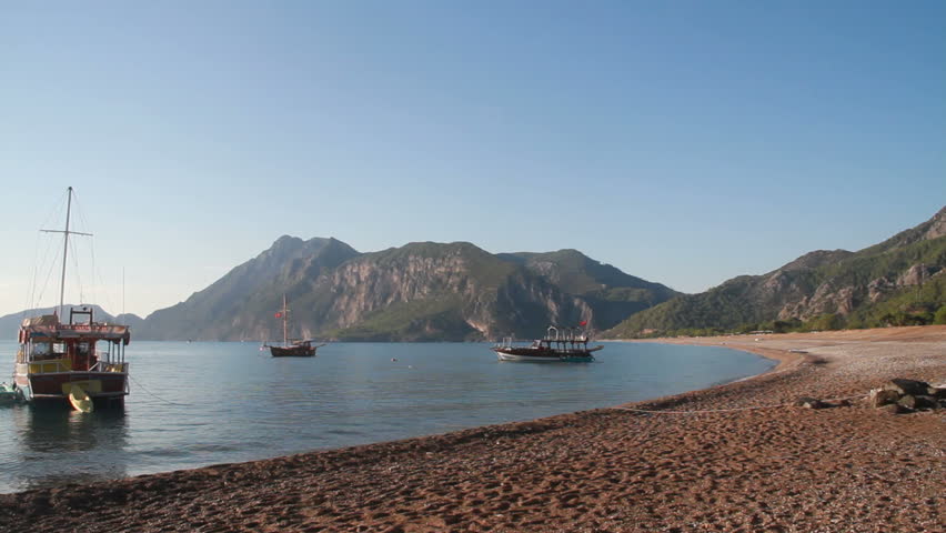 deserted beach, the sea and the ships in Turkey