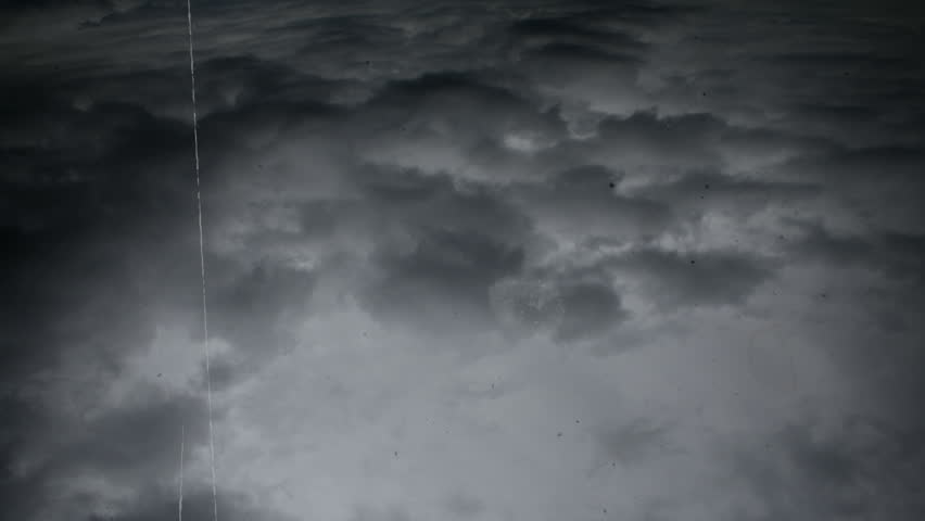 vintage damaged footage of clouds