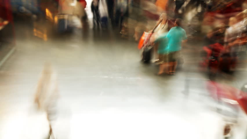 fast moving crowd of people, at rome's temini train station