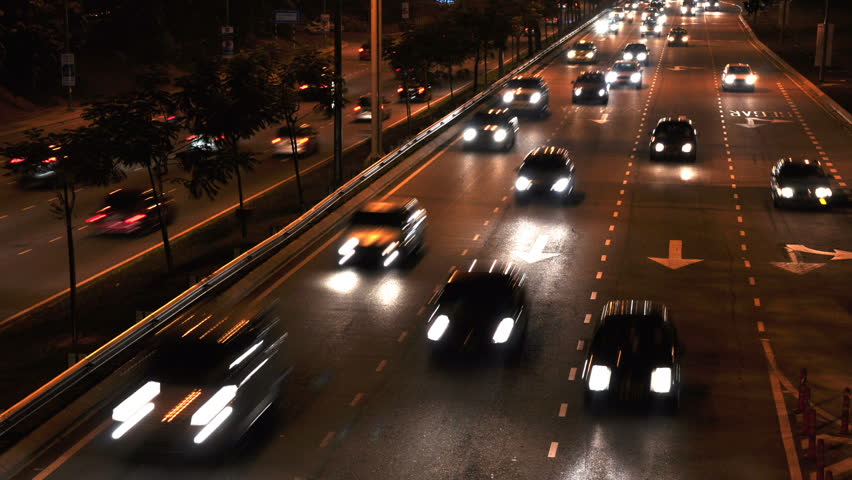 Cars moving on busy roads at night, Kuala Lumpur, Malaysia
