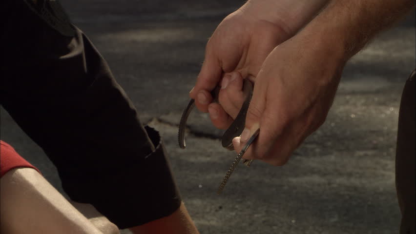 Criminal detention, close of an criminal's hands being handcuffed