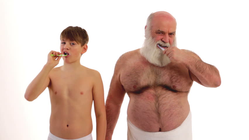 Grandpa And His Grandson Brushing Their Teeth Stock Footage Video