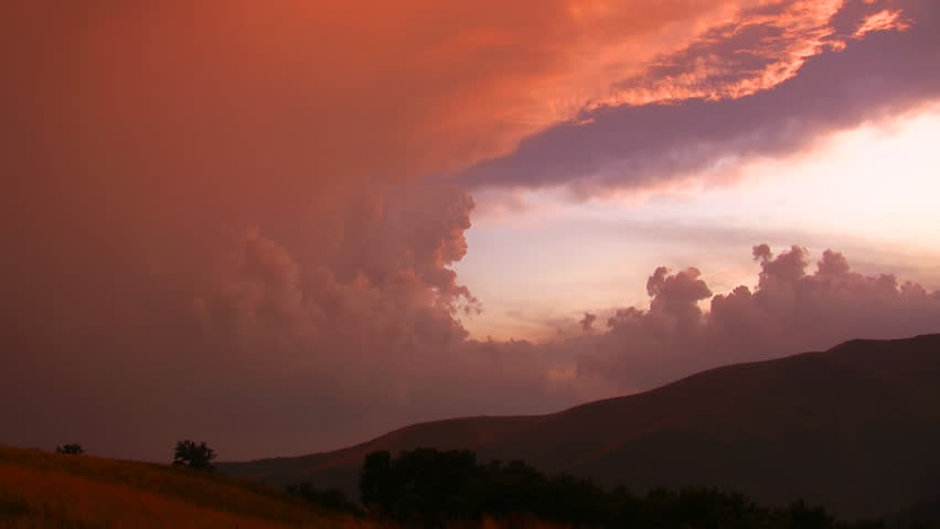 Dramatic sky after thunderstorm in mountains, clouds quickly change forms, timelapse, HD