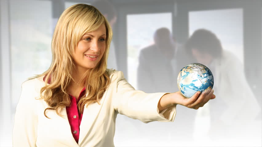 Young Woman Holding a 3d roating globe in her hand.  
