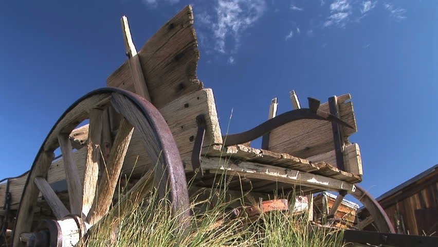 Weathered horse drawn carriage in the ghost town of Bodie