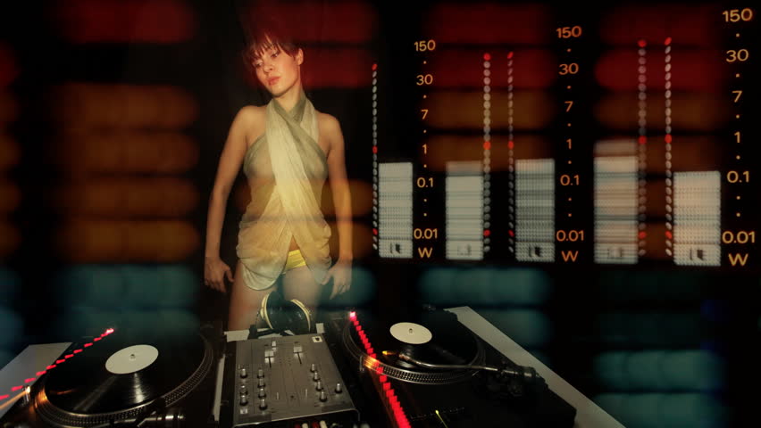 beautiful young female dj, behind the decks at a club