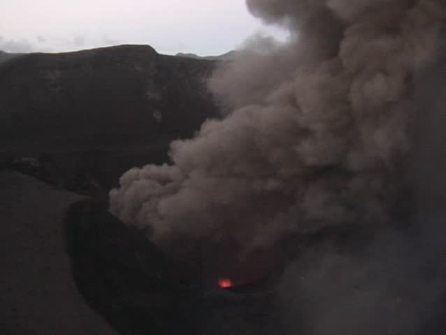 Erupting Volcano from the outer crater rim after sunset