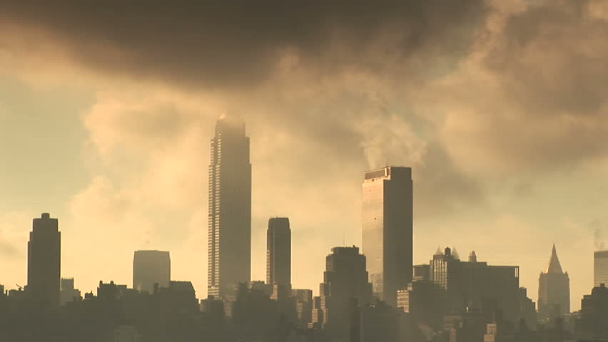 A steamy morning looking over the New York City Skyline. Dark and moody with fast moving clouds
