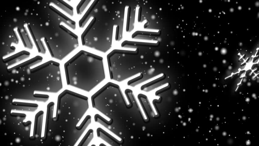 HD 720 p. Snow flurries and big decorative flakes fall against pitch black sky with moving clouds in seamless widescreen loop.