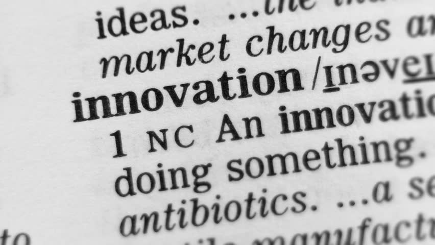 Dictionary Definition - Innovation. Selective focus on the word. 