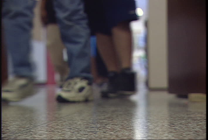 soft focus low angle of kids changing classes