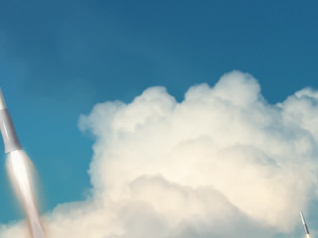 Looping animation of a group of missiles being launched and in flight.