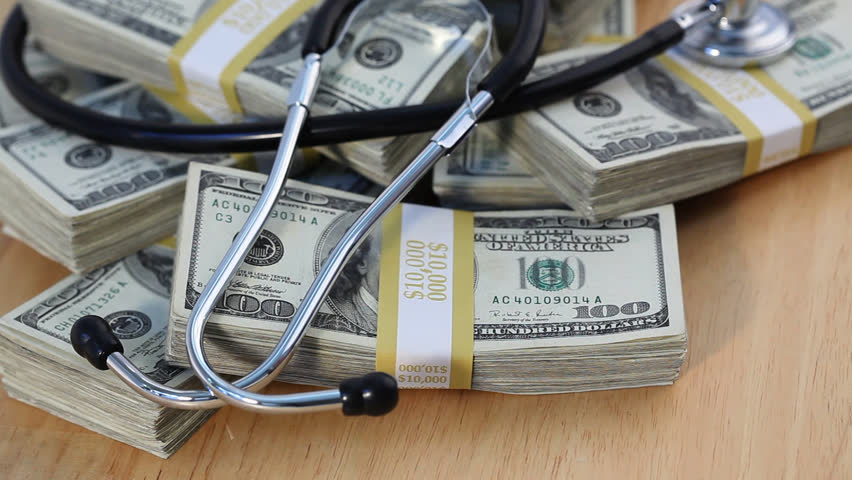 Stethoscope on Pile of Cash - 1920x1080.