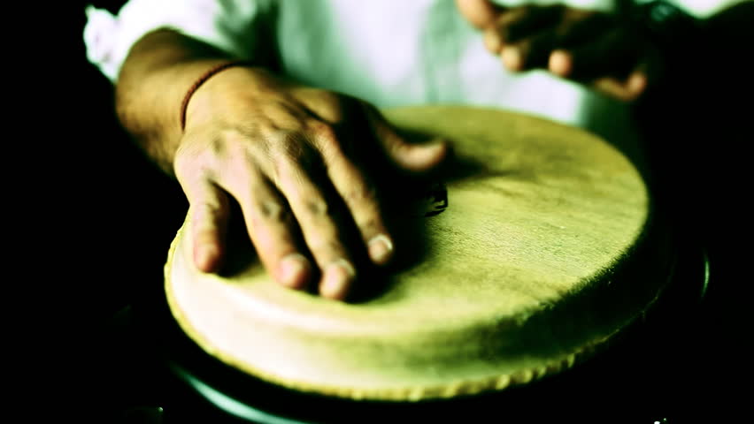 congo drummer performing. CLIP INCLUDES HIGH QUALITY AUDIO