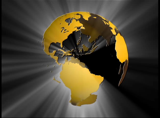 Globe Seamless Loop spins one time every thirty seconds. Changing, multicolored land masses (no oceans) have shimmering white light rays shining forth.