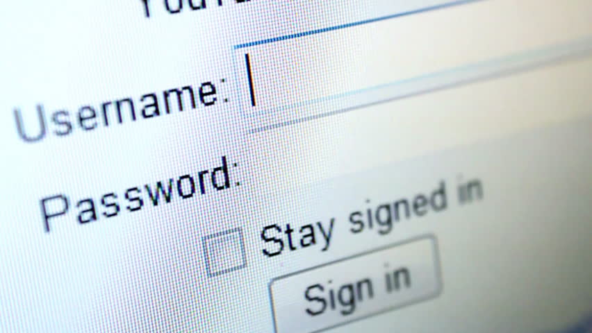 A login form on a computer screen with the user inputting their information.