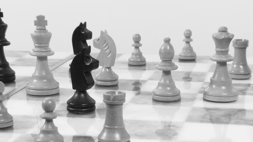 Chess board with chess pieces dolly shot