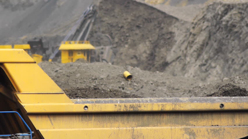 Off-road dump truck in the open pit mine