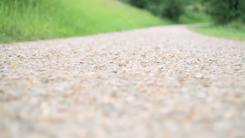 Closeup of running shoes and legs in action