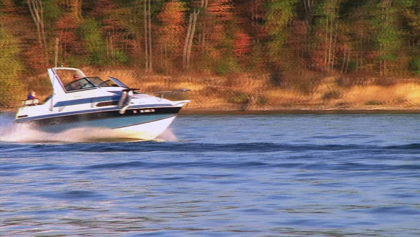 Speedboat on lake in early autumn - audio from shotgun microphone.


