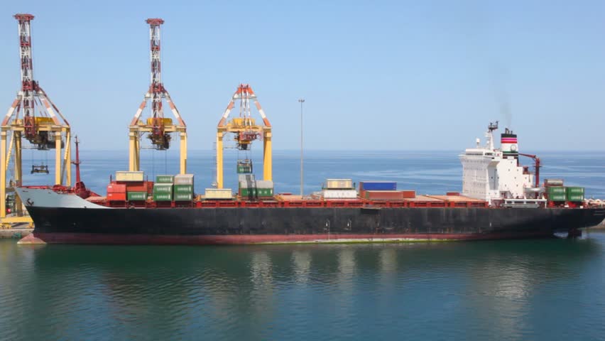 cargo-ship with containers on shipboard in seaport