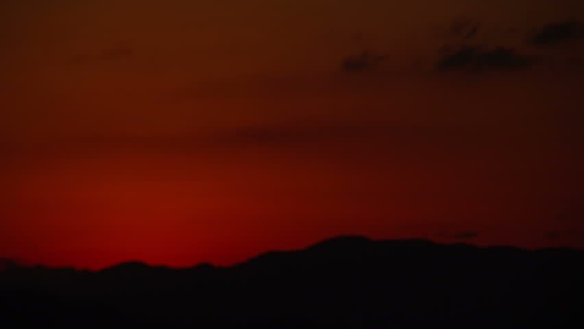 rising sun behind mountain wide
