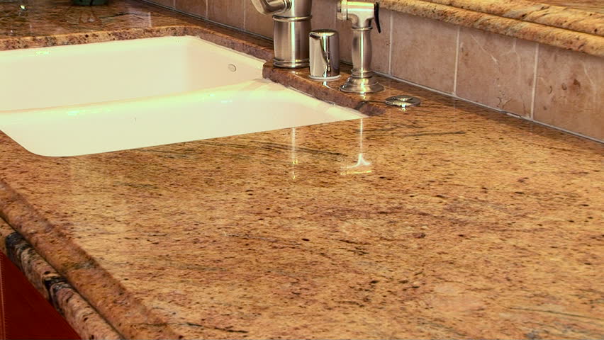 Woman cleaning countertop 