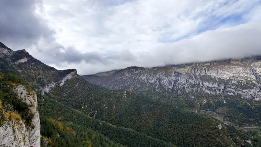 Panning shot of the mountains and scenery from pedraforca mountain, Cataluna, spain