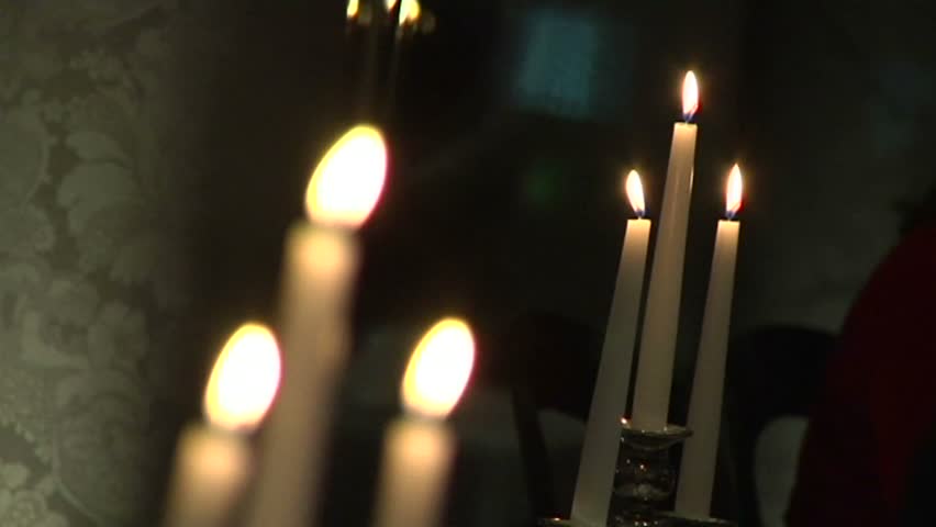 Six candles burning