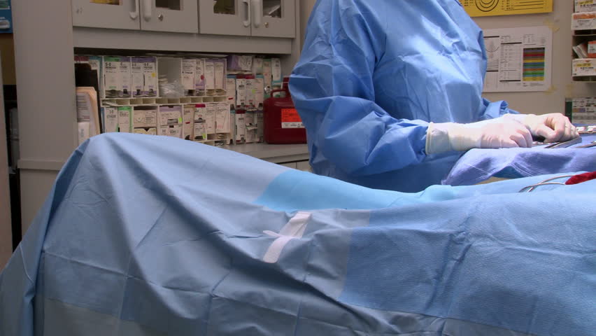 Tracking past surgeons working over patient on an operating table