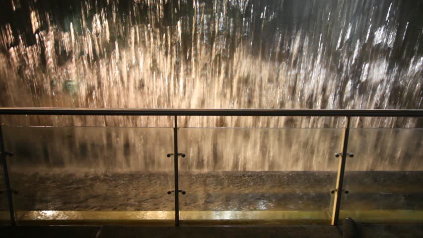 railing and artificial waterfall with illumination indoor
