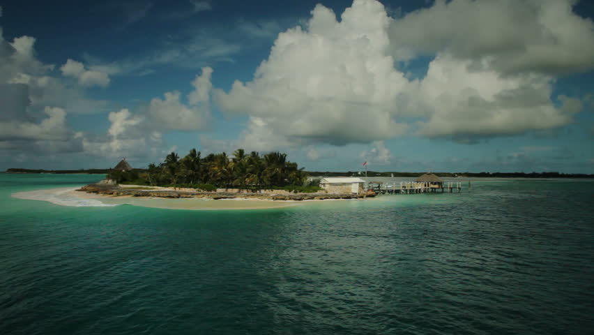Aerial shot of a private luxury island in the Bahamas (Part 1 of 2).