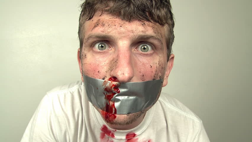 Man with bloody nose and duct tape