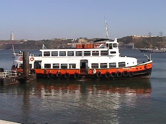 Ferry boat leaving at the pier