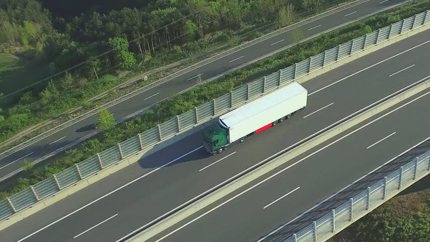 Aerial: Freight Truck Transporting Cargo Stock Footage Video (100%