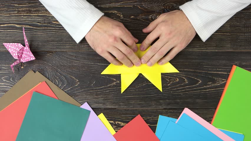 Man Folding Origami Figure Top Stock Footage Video 100 Royalty Free 1010409089 Shutterstock