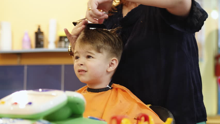 Child Hairstyle Hairdresser Working With Stock Footage Video 100