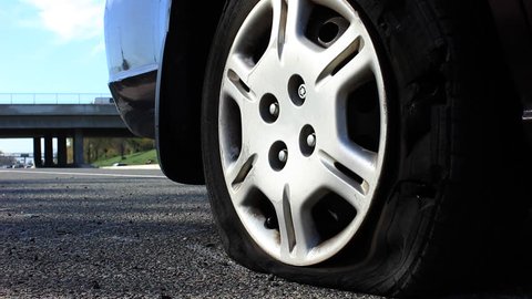 How to fix a flat tire: What to do if you have a flat and no spare