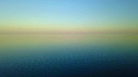 Ocean Color Palette Stock Footage 4k And Hd Clips Aerial Footage Of Purple Sunset On Beautiful Calm Water Ocean Surface In Warm Evening Twilight