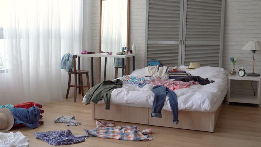 Image result for clothes on bed messy