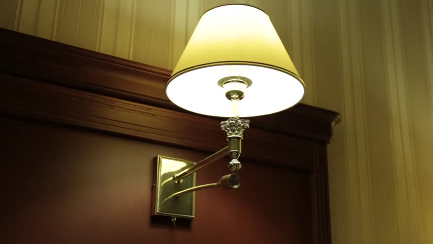 Hd00 12a Classic Lamp With A Shade Turning The Light Off And On Living A Classic Lamp With Shade Turning The Light Off And On Living Room Wallpaper Electricity Saving Earth Hour