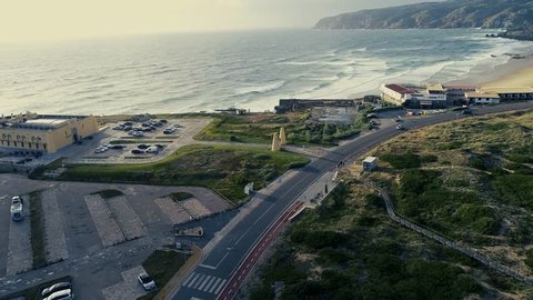 Aerial view of coastline road and Beautiful drive through coastal road along beach. Portugal.